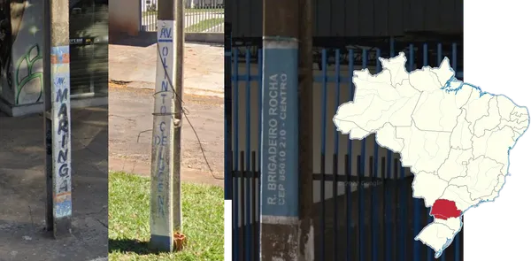 Табличка с названием улицы на столбе электропередач в Паране, Бразилия
