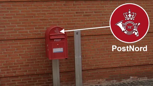 PostNord Post Danmark почтовый ящик у входа жилого дома в Дании