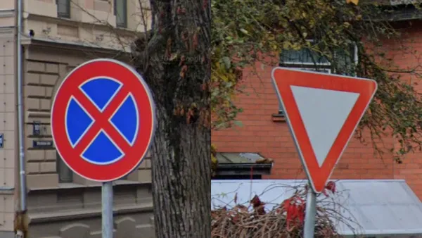 Латвийский дорожный знак предупреждения с толстой красной каймой и белым контуром