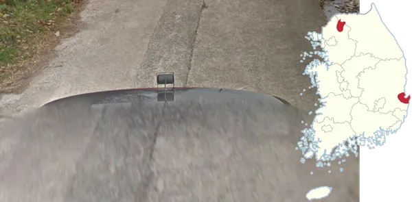 Небольшая камера Street View над стоп-сигналом к северо-востоку от Сеула