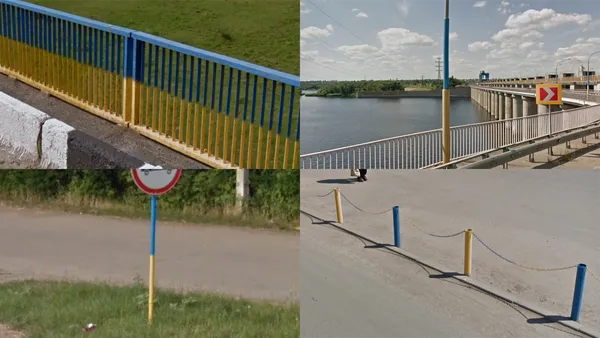 Забор, окрашенный в синий и желтый цвета украинского флага