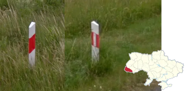Красный светоотражающий столбик у дороги в Закарпатье, Украина
